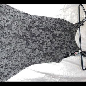 Cute gray dress with little embroidered flowers and with a laced back size small